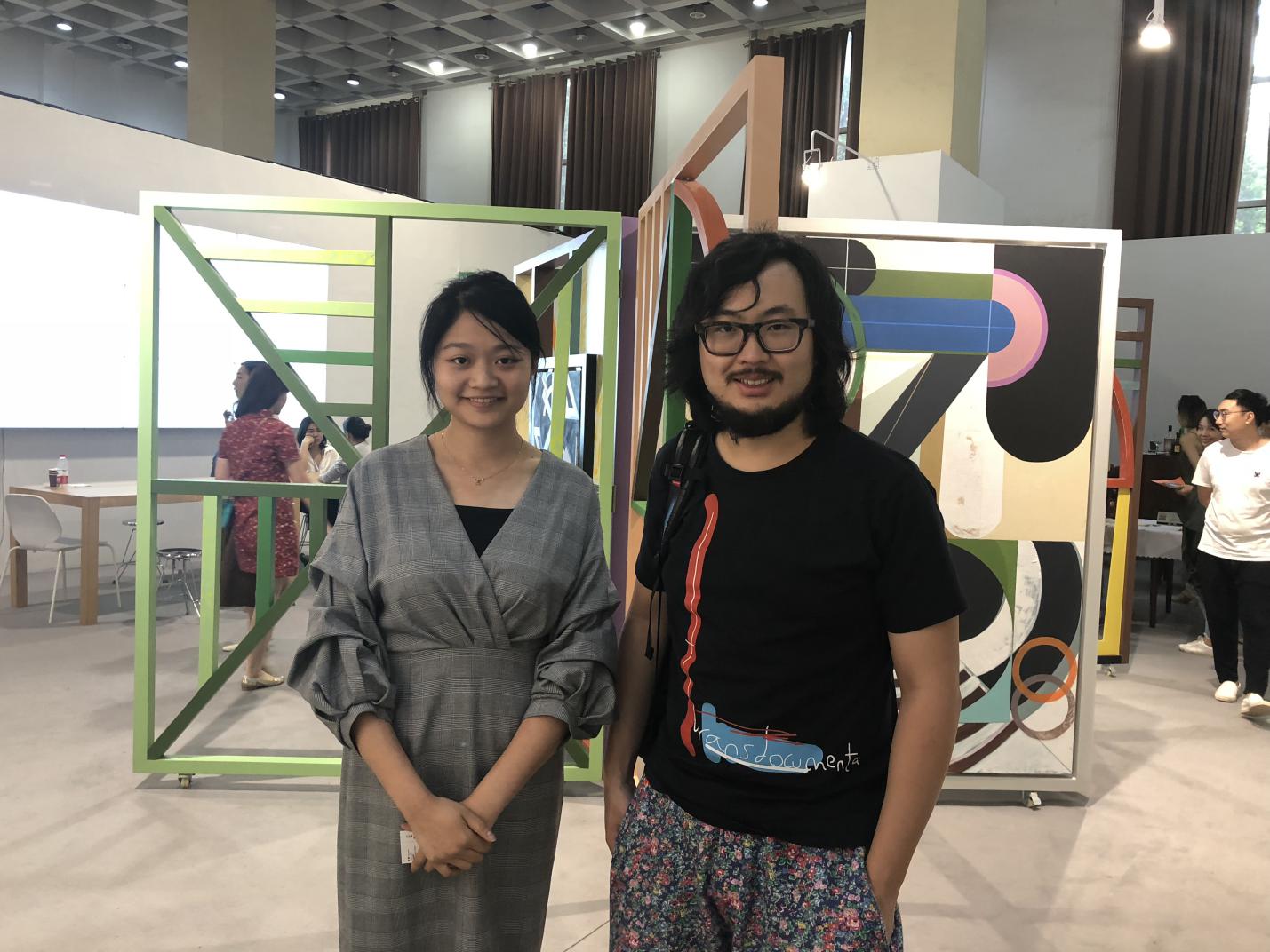 コレクターの周艟と江上越